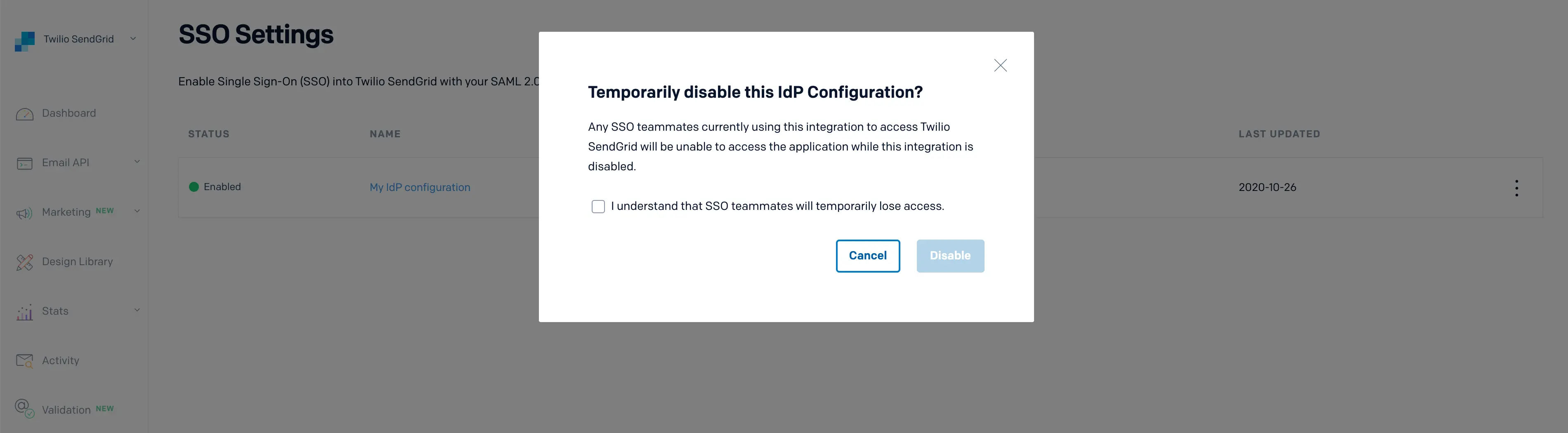 Confirmation modal to disable Twilio SendGrid IdP configuration with cancel and disable options.