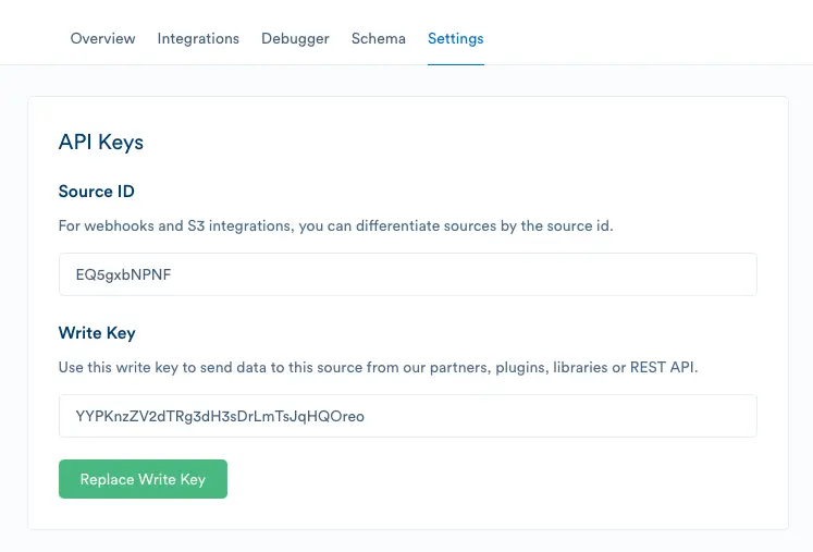 API keys settings page showing Source ID and Write Key fields with replace button.